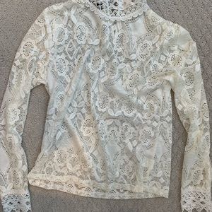 White lace blouse with high neck